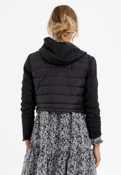 Shortened quilted jacket with scuba patchwork